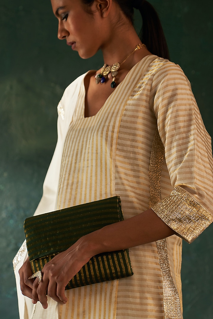 Green Silk Tissue Striped Hand Clutch by Charkhee Accessories at Pernia's Pop Up Shop