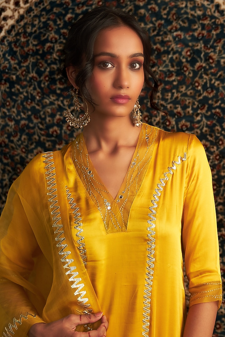 Marigold Yellow Modal Satin Embroidered Kurta Set by Charkhee at Pernia's Pop Up Shop