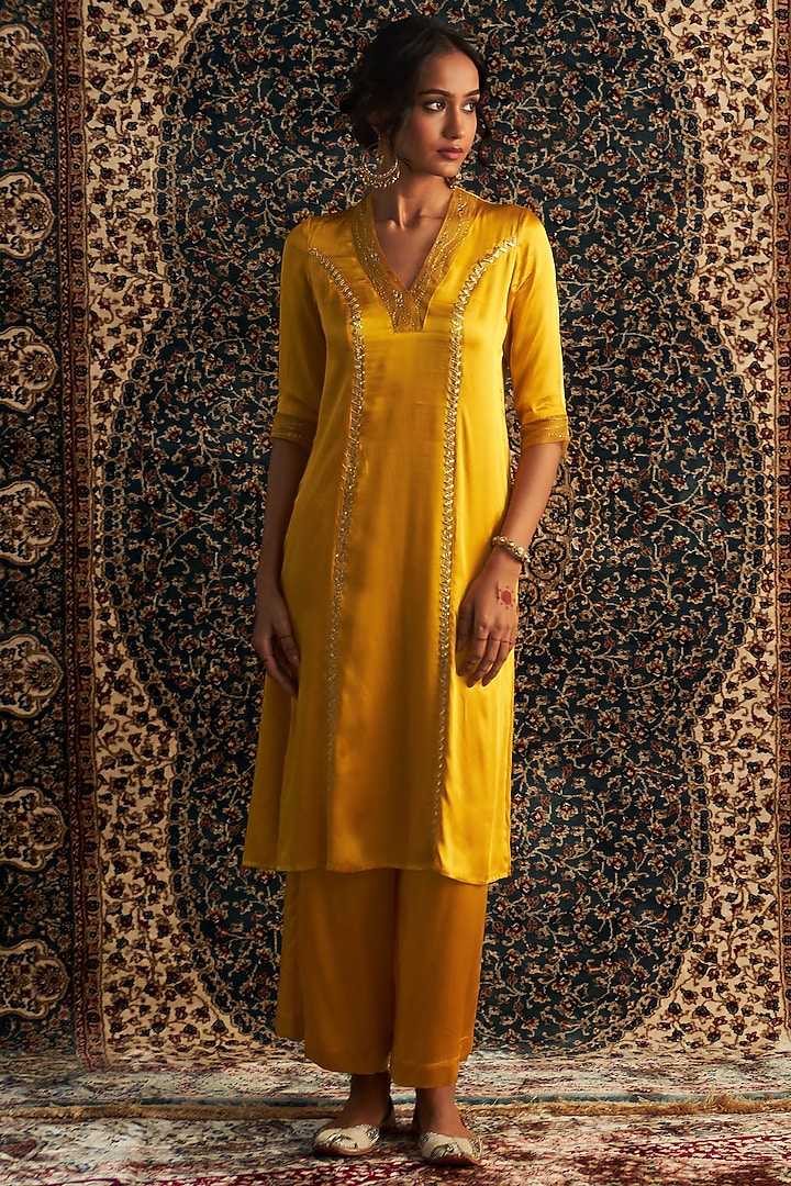 Marigold Yellow Modal Satin Embroidered Kurta Set by Charkhee at Pernia's Pop Up Shop