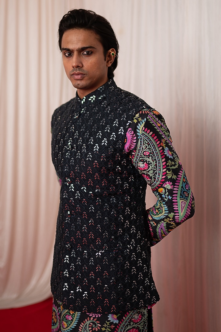 Black Chanderi Silk & Cotton Satin Mirror Work Bundi Jacket Set by chrkha men at Pernia's Pop Up Shop