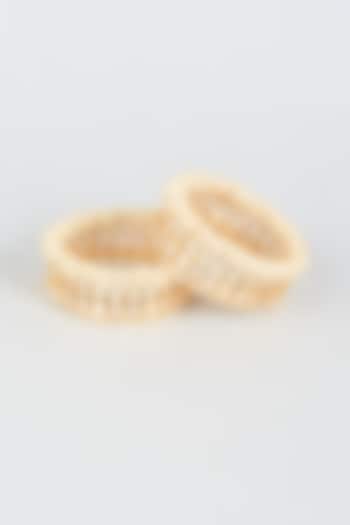 Gold Finish Moti & Kundan Polki Bangles (Set of 2) by CHAOTIQ BY ARTI at Pernia's Pop Up Shop