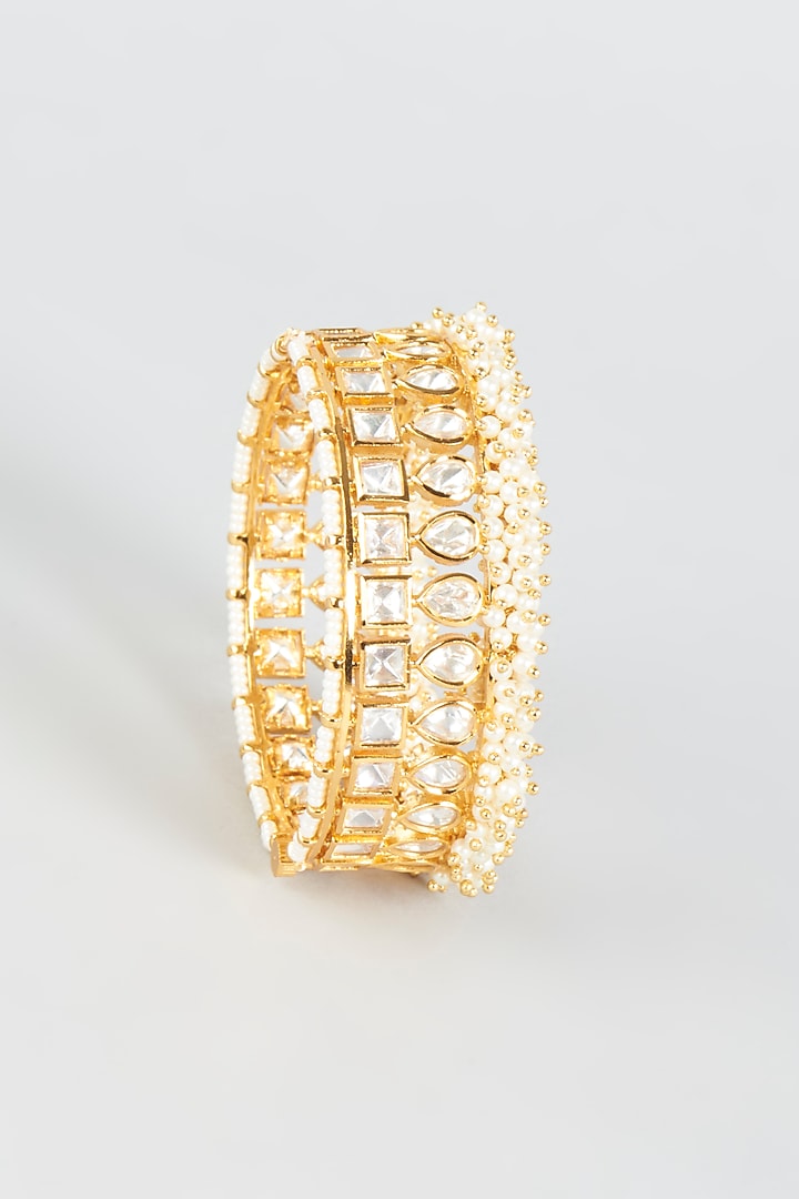 Gold Finish Moti & Kundan Polki Bangles (Set of 2) by CHAOTIQ BY ARTI at Pernia's Pop Up Shop