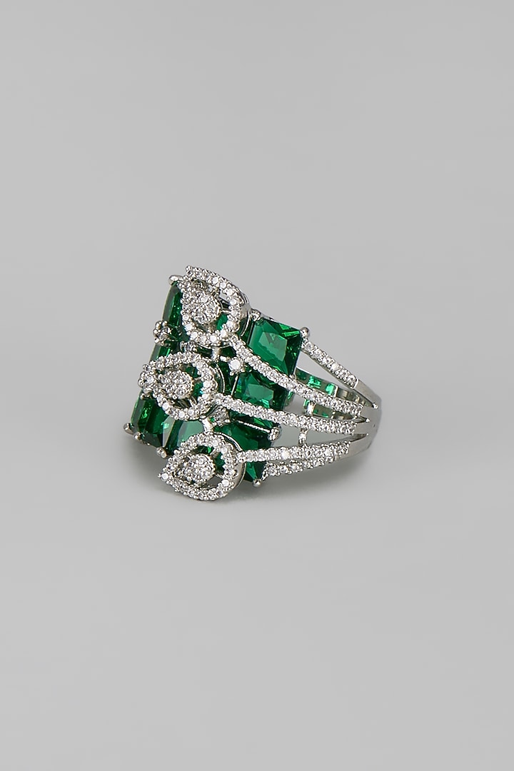 White Rhodium Finish Diamond & Emerald Adjustable Ring by CHAOTIQ BY ARTI at Pernia's Pop Up Shop