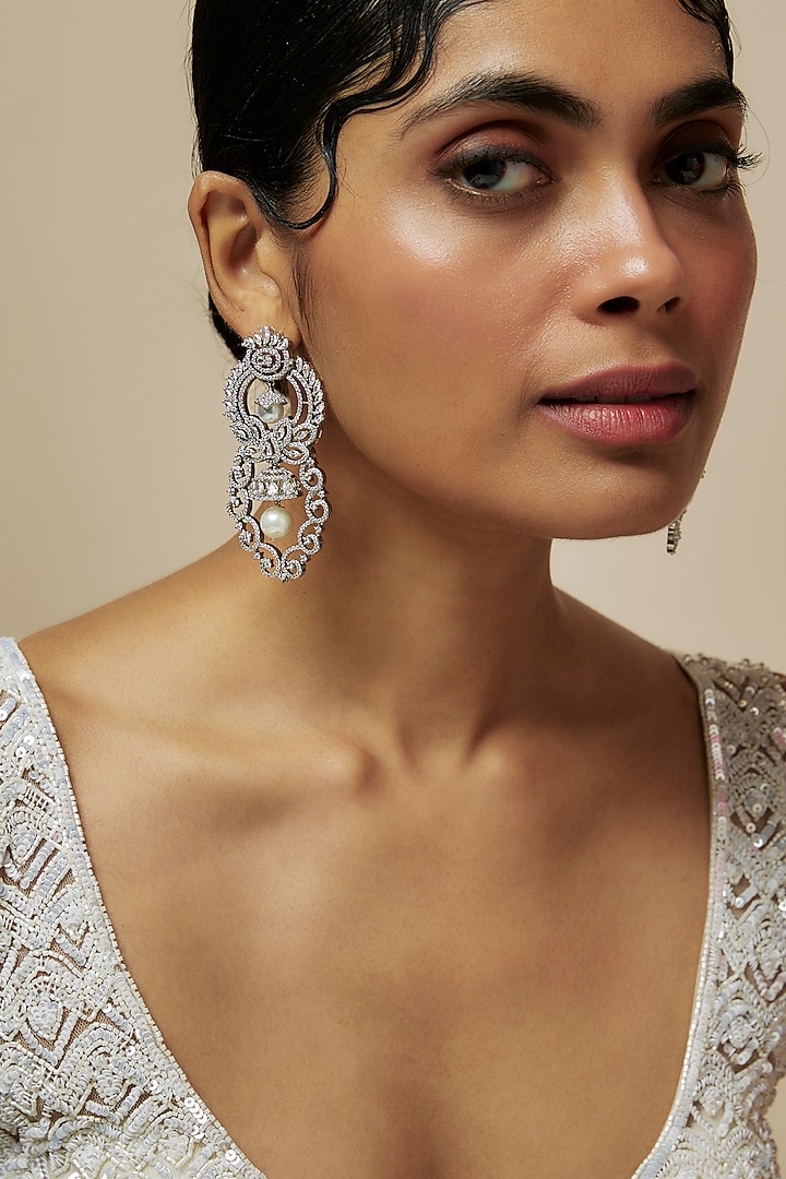 White Rhodium Finish Diamond Dangler Earrings by CHAOTIQ BY ARTI