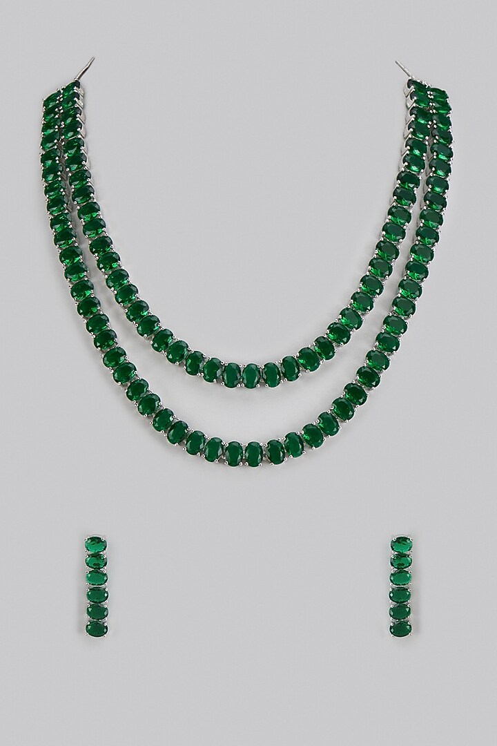 White Rhodium Finish Diamond & Emerald Layered Necklace Set by CHAOTIQ BY ARTI at Pernia's Pop Up Shop