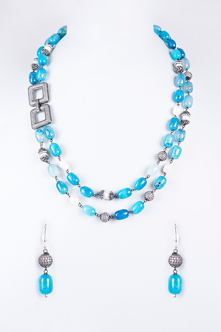 White Finish Beaded Layered Necklace Set by CHAOTIQ BY ARTI at Pernia's Pop Up Shop