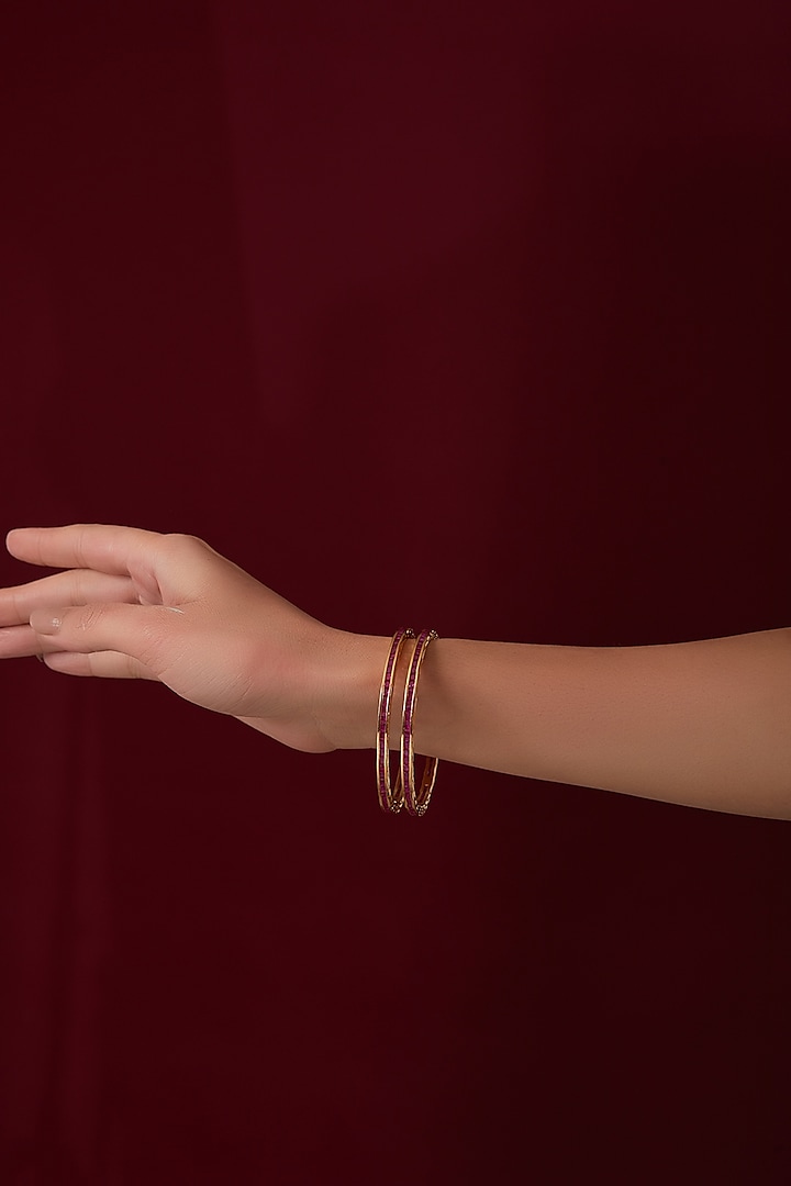 Gold Finish Synthetic Ruby Stone Bangles (Set of 2) by CHAOTIQ BY ARTI at Pernia's Pop Up Shop