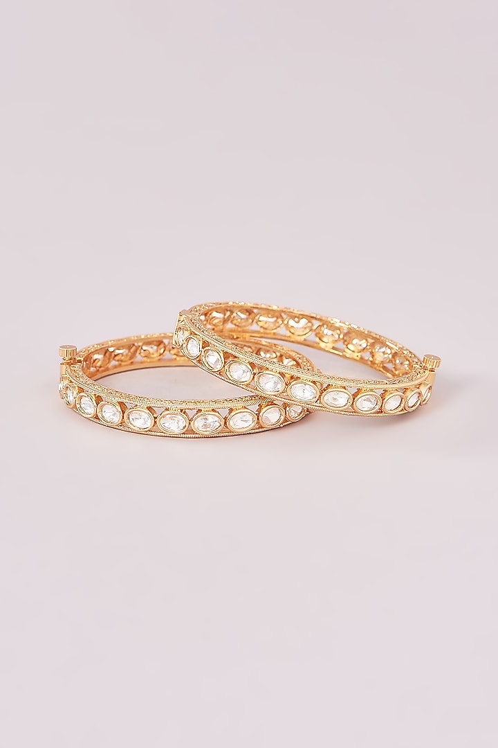 Gold Finish Kundan Polki Bangles (Set of 2) by CHAOTIQ BY ARTI at Pernia's Pop Up Shop