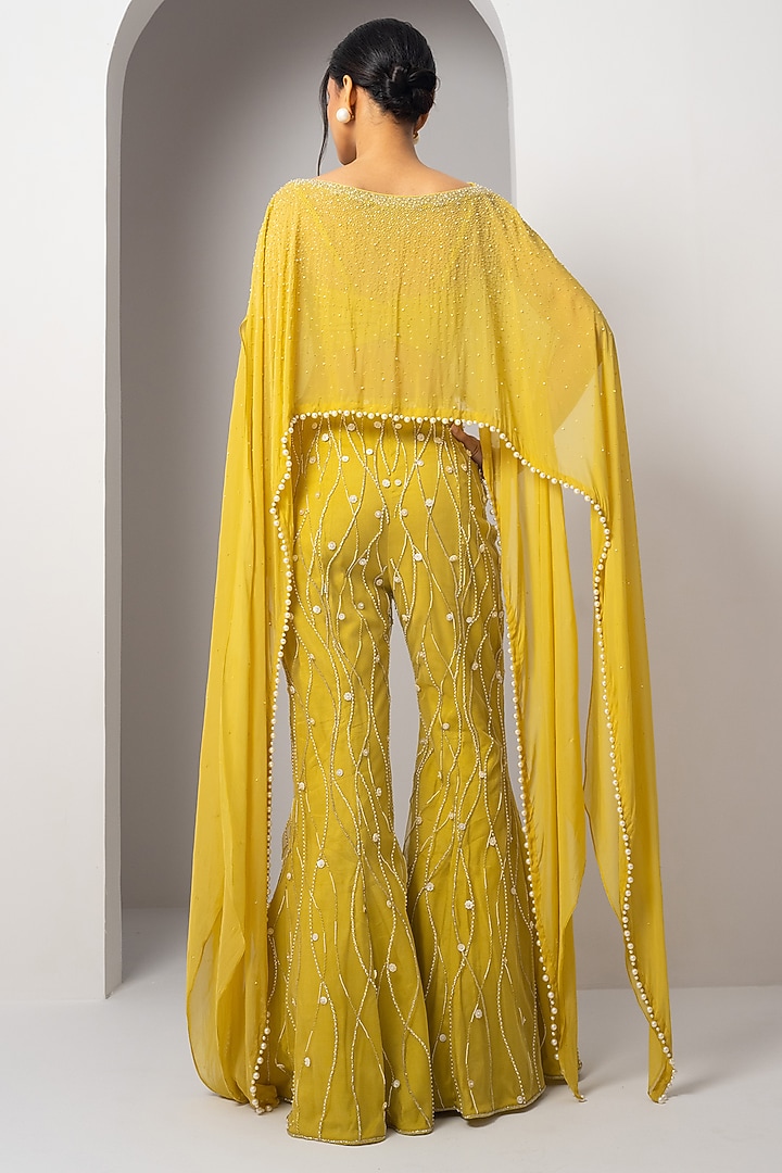 Buttercup Yellow Net Mother Of Pearl Embroidered Pant Set by Charu & Vasundhara at Pernia's Pop Up Shop