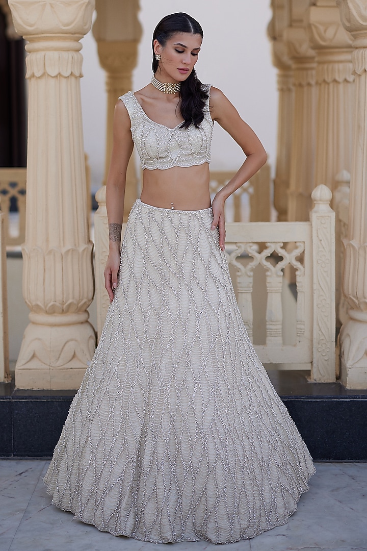Ivory Net Wave Embroidered Bridal Lehenga Set by Charu & Vasundhara at Pernia's Pop Up Shop