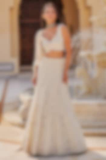 Ivory Net Floral Embroidered Bridal Lehenga Set by Charu & Vasundhara at Pernia's Pop Up Shop