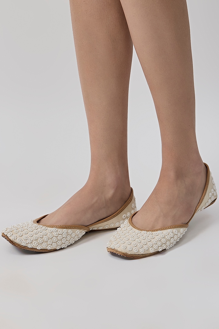 White Genuine Leather Pearl Work Juttis by Coral Haze at Pernia's Pop Up Shop