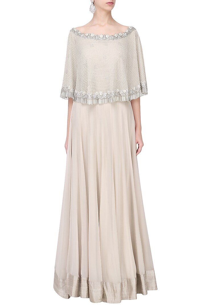 Nude zardozi embroidered cape with lehenga set available only at Pernia's Pop Up Shop.