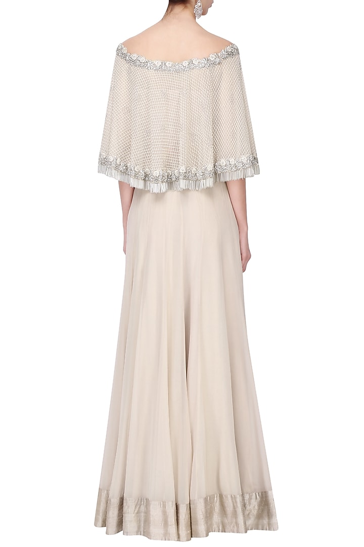 Nude zardozi embroidered cape with lehenga set available only at Pernia's Pop Up Shop.