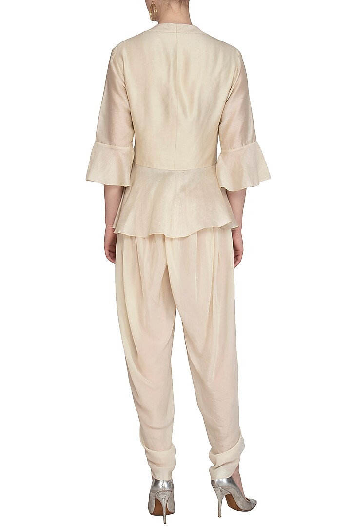 Cream Embroidered Peplum Top With Dhoti Pants by Chhavvi Aggarwal at Pernia's Pop Up Shop