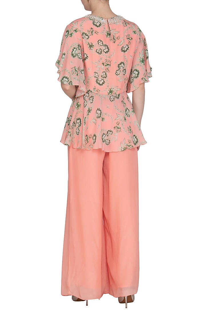 Peach Printed Pearl Peplum Top With Pleated Pants by Chhavvi Aggarwal at Pernia's Pop Up Shop