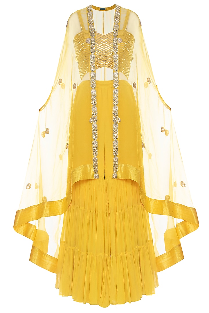 Yellow embroidered sharara set with cape by CHHAVVI AGGARWAL