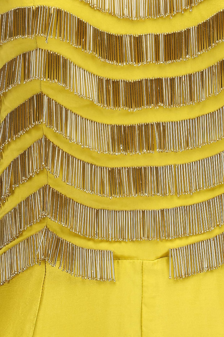 Yellow and gold fringe detail jumpsuit available only at Pernia's Pop Up Shop.
