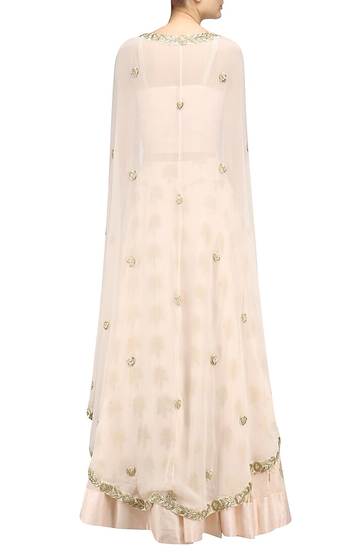 Pale pink floral embroidered lehenga, blouse and cape set available only at Pernia's Pop Up Shop.