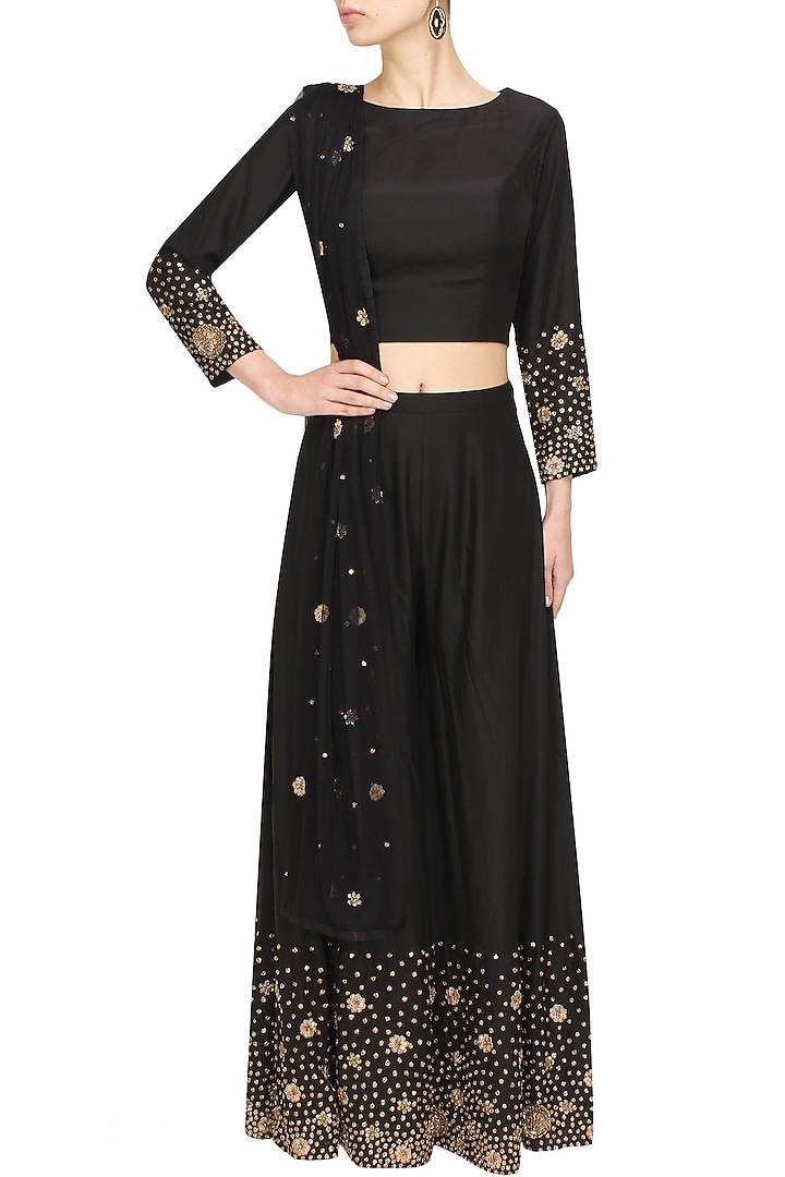 Black zardozi and sequins embroidered crop top and palazzo pants set available only at Pernia's Pop Up Shop.