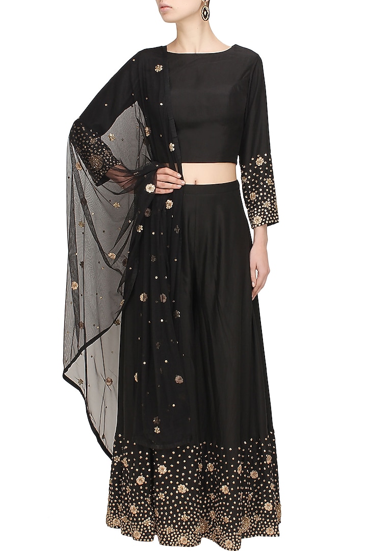 Black zardozi and sequins embroidered crop top and palazzo pants set available only at Pernia's Pop Up Shop.