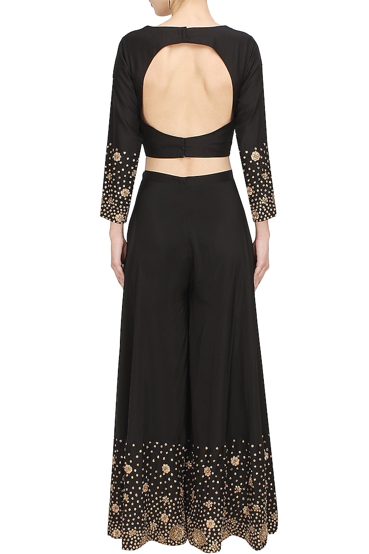 Black zardozi and sequins embroidered crop top and palazzo pants set available only at Pernia's Pop Up Shop.