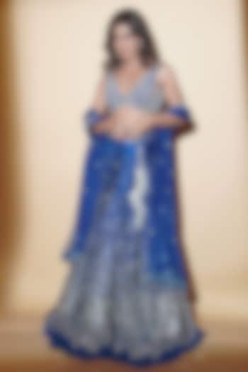 Blue Raw SIlk Mirror Hand Embroidered Lehenga Set by Archana Kochhar