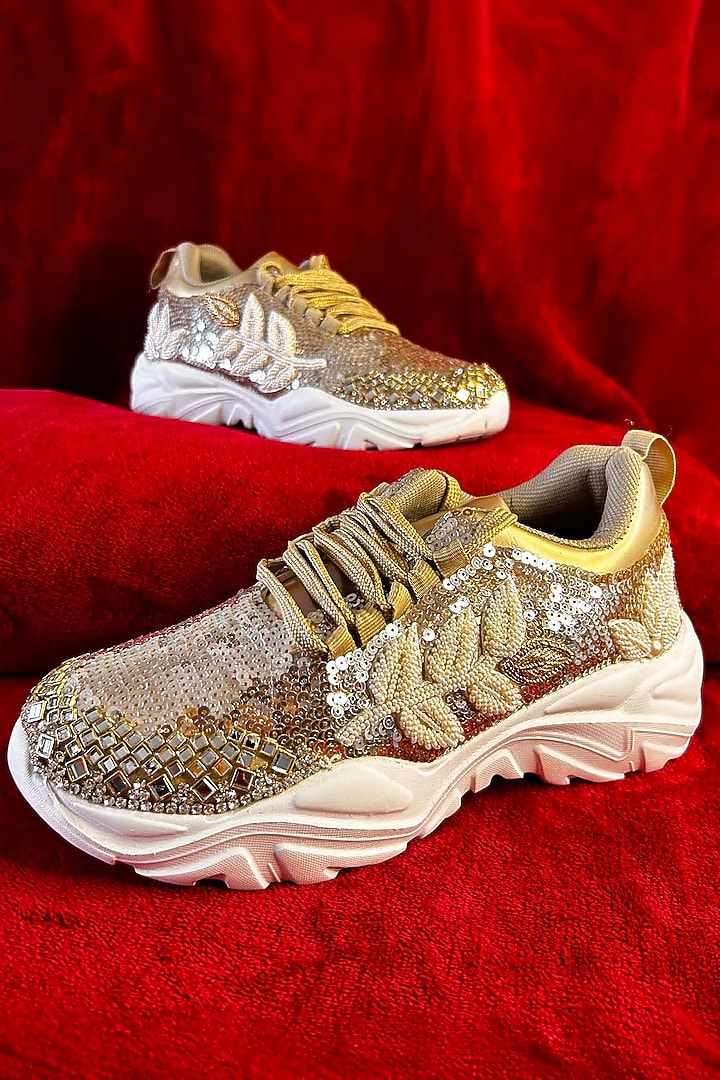 Rose Gold Synthetic Leather Embellished Sneakers by Chal Jooti at Pernia's Pop Up Shop