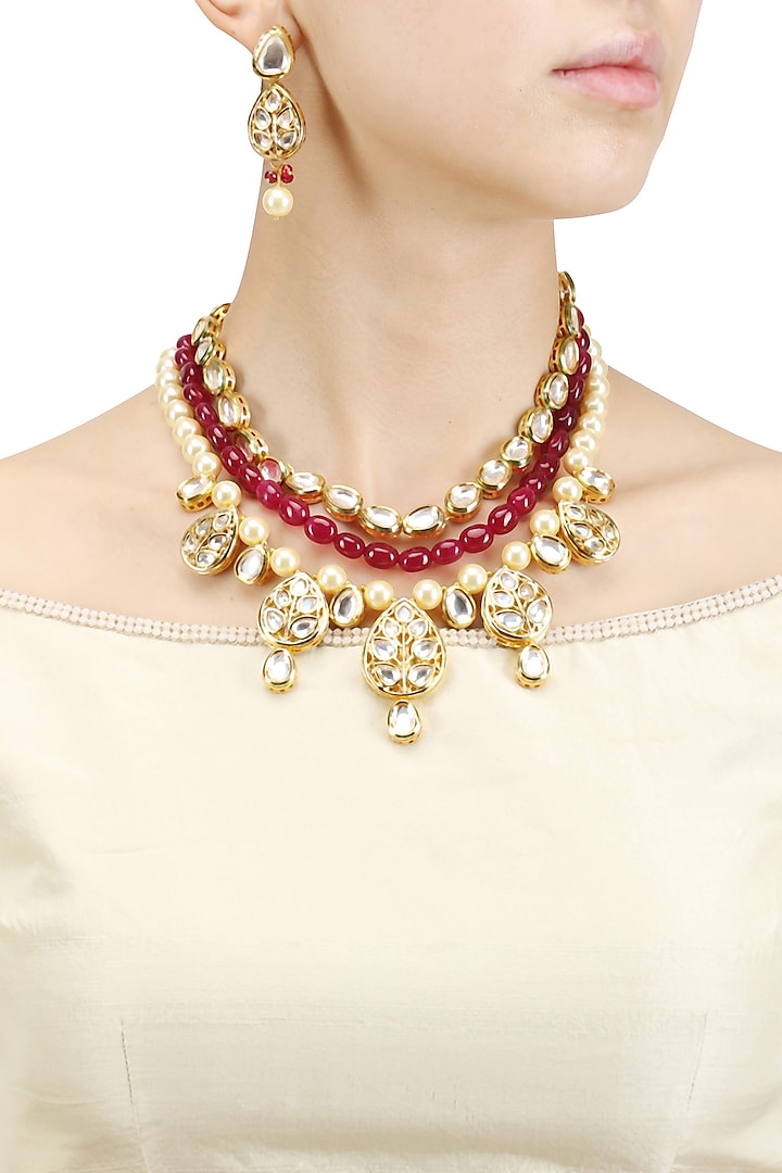 Gold Finish Kundan and Red Stone Necklace Set by Chhavi's Jewels