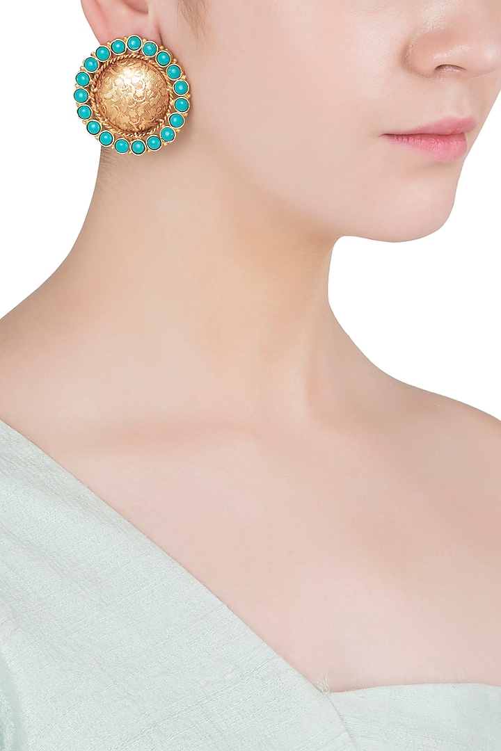 Gold Finish Textured Blue Stones Stud Earrings by Chhavi's Jewels