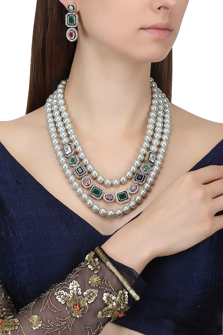 Gold Finish Pearl and Semi Precious Stones Necklace Set by Chhavi's Jewels