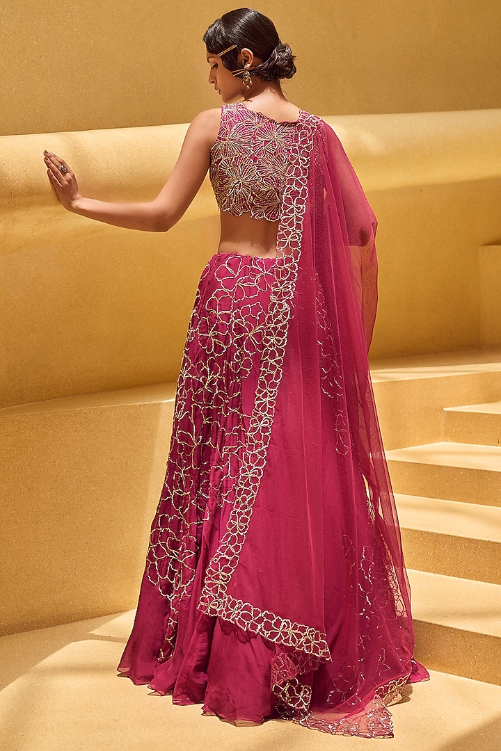 Rasberry Pink Tussar & Net Hand Embroidered Wedding Lehenga Set by Charu & Vasundhara at Pernia's Pop Up Shop