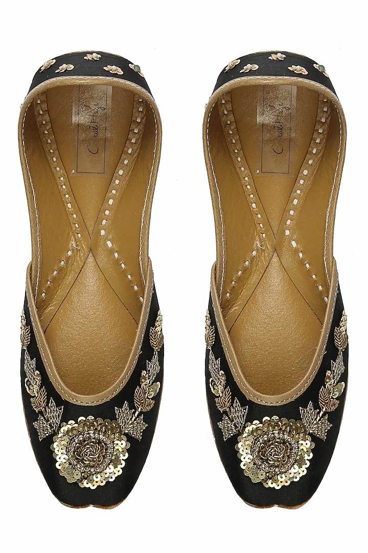 Deep black and gold floral zardozi embroidered juttis by Coral Haze