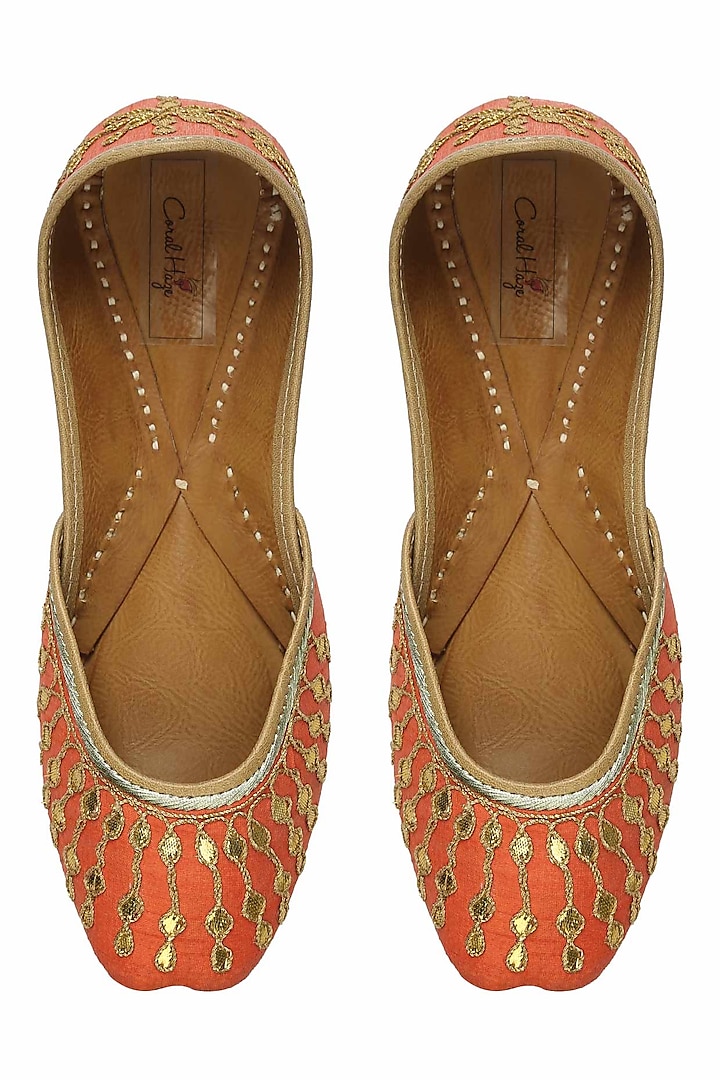 Bright orange and gold gota patti embroidered juttis by Coral Haze