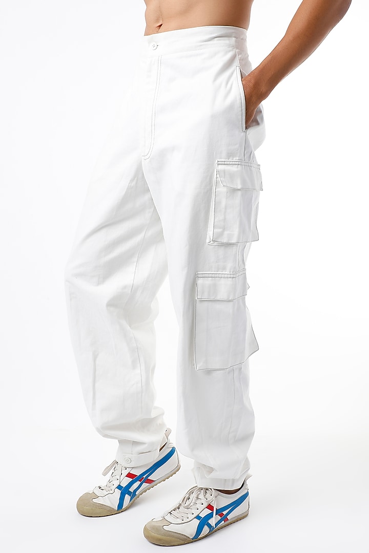 White Soft Denim Cargo Pants by The Circus by Sana Shah Bhattad Men at Pernia's Pop Up Shop