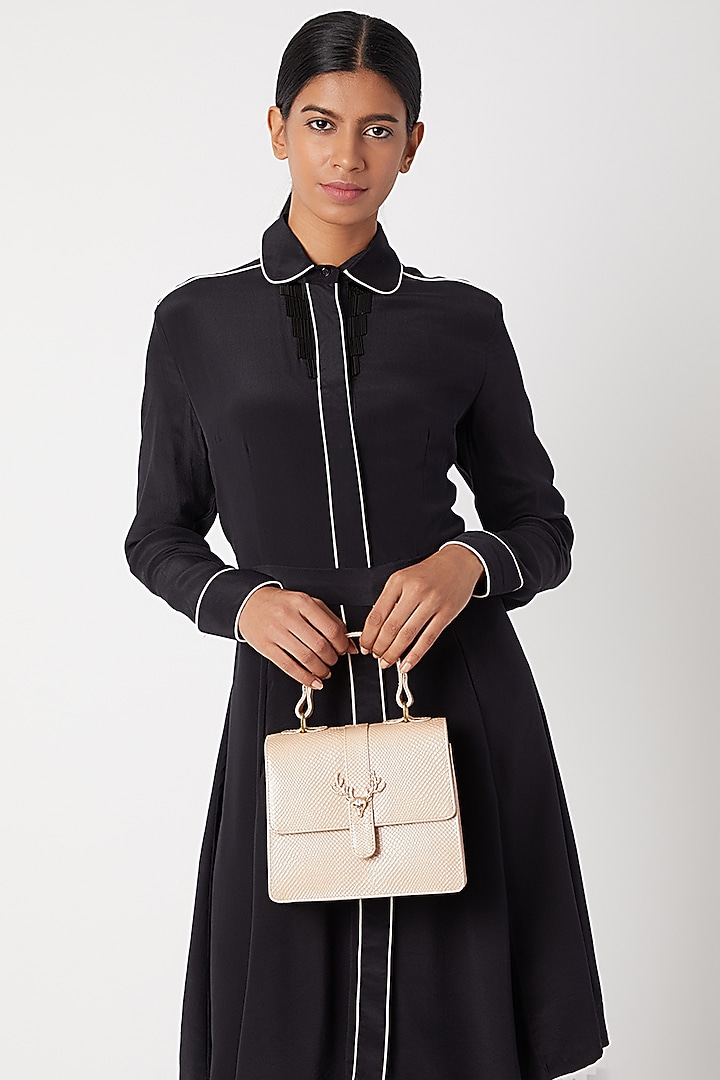 Peachish Gold Leather Clutch by Clutch'D at Pernia's Pop Up Shop