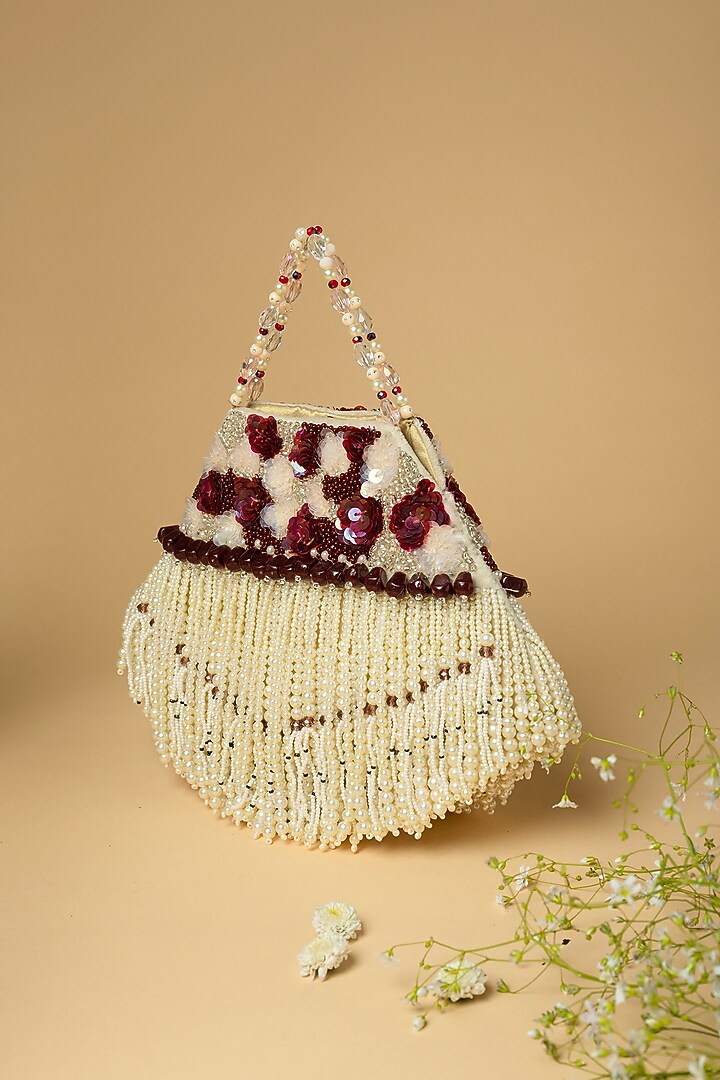Ivory Cotton Silk Pearl Embellished Bag by Clutch'D at Pernia's Pop Up Shop