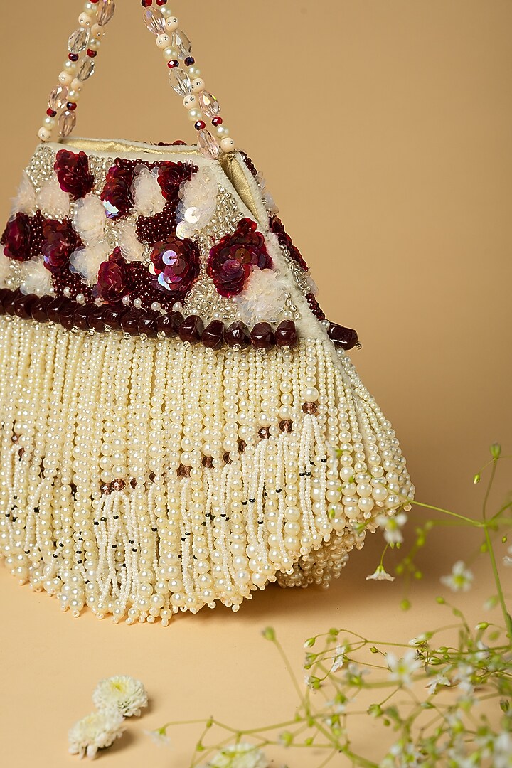 Ivory Cotton Silk Pearl Embellished Bag by Clutch'D at Pernia's Pop Up Shop