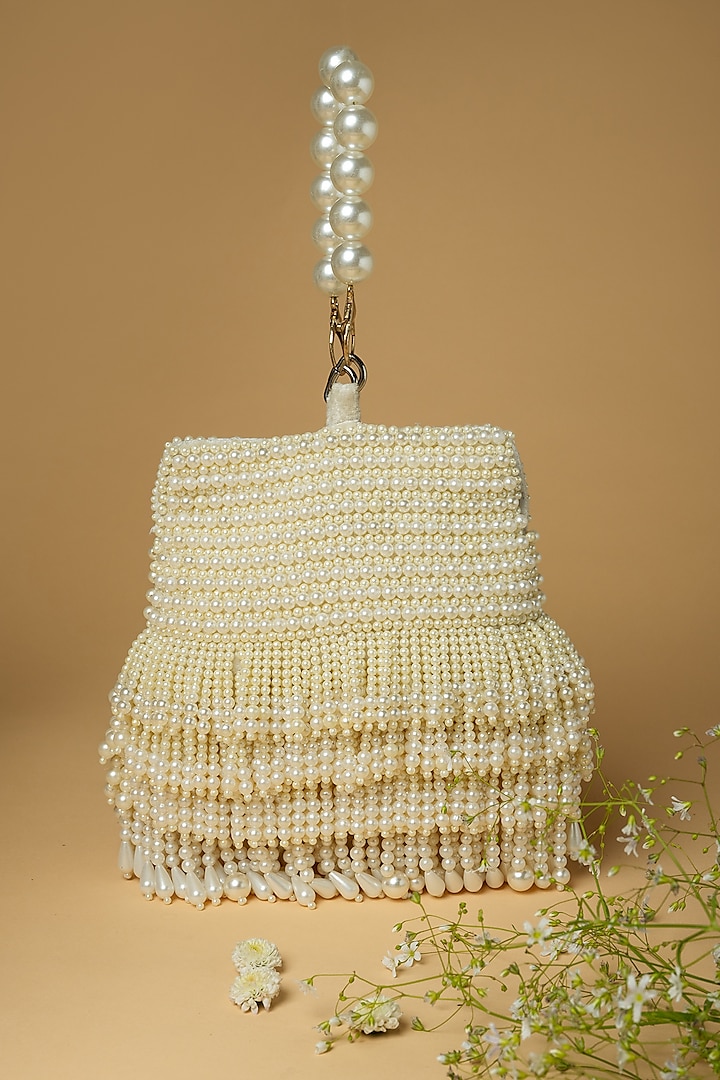 Ivory Cotton Silk Pearl Embellished Bag by Clutch'D at Pernia's Pop Up Shop