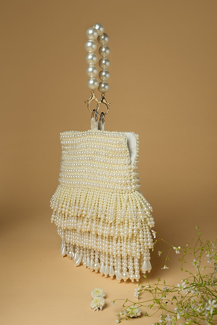Ivory Cotton Silk Pearl Embellished Bag by Clutch'D at Pernia's Pop Up Shop