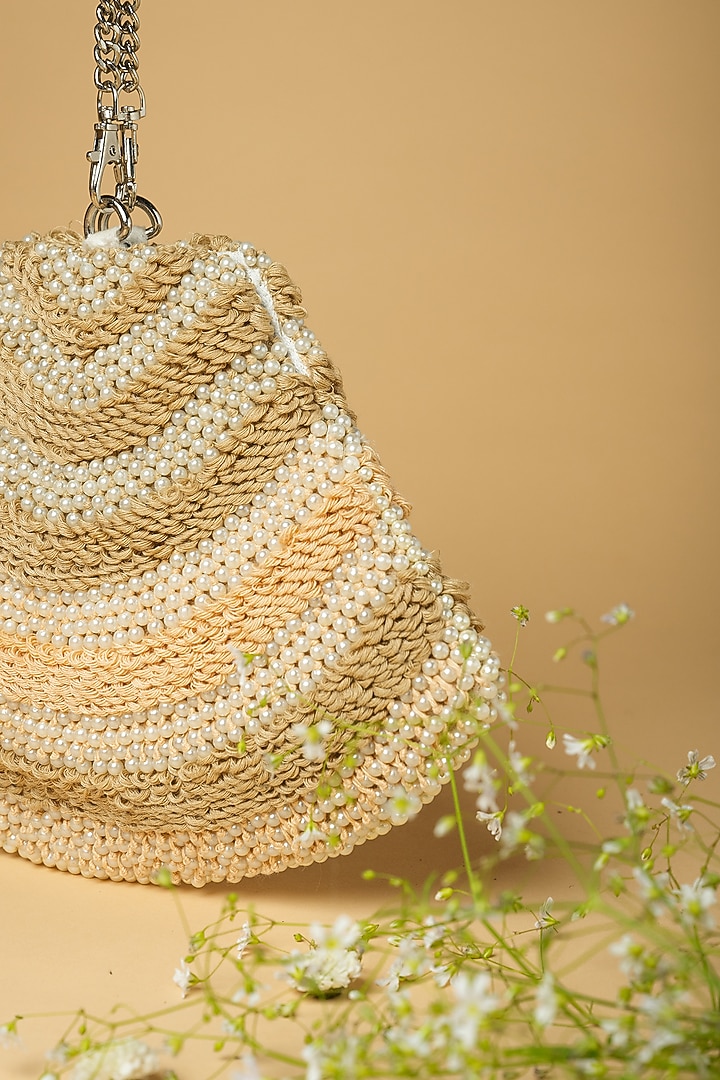 Ivory Cotton Silk Pearl Embellished Bag by Clutch'D at Pernia's Pop Up Shop
