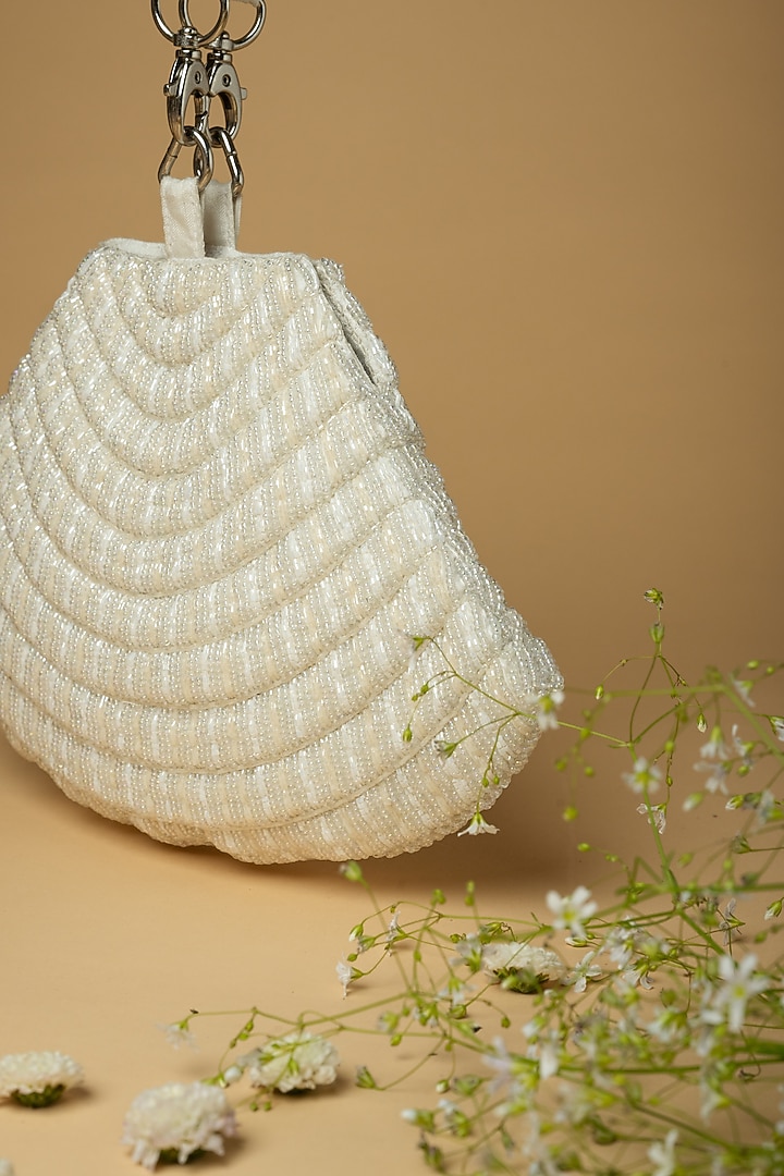 White Cotton Silk Pearl Embellished Bag by Clutch'D at Pernia's Pop Up Shop