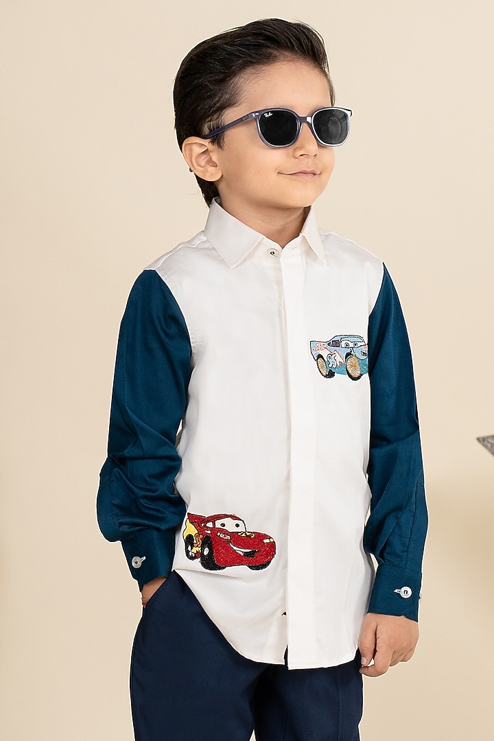 White & Navy Blue Cotton Satin Motif Embroidered Color-Blocked Shirt For Boys by Little Boys Closet at Pernia's Pop Up Shop