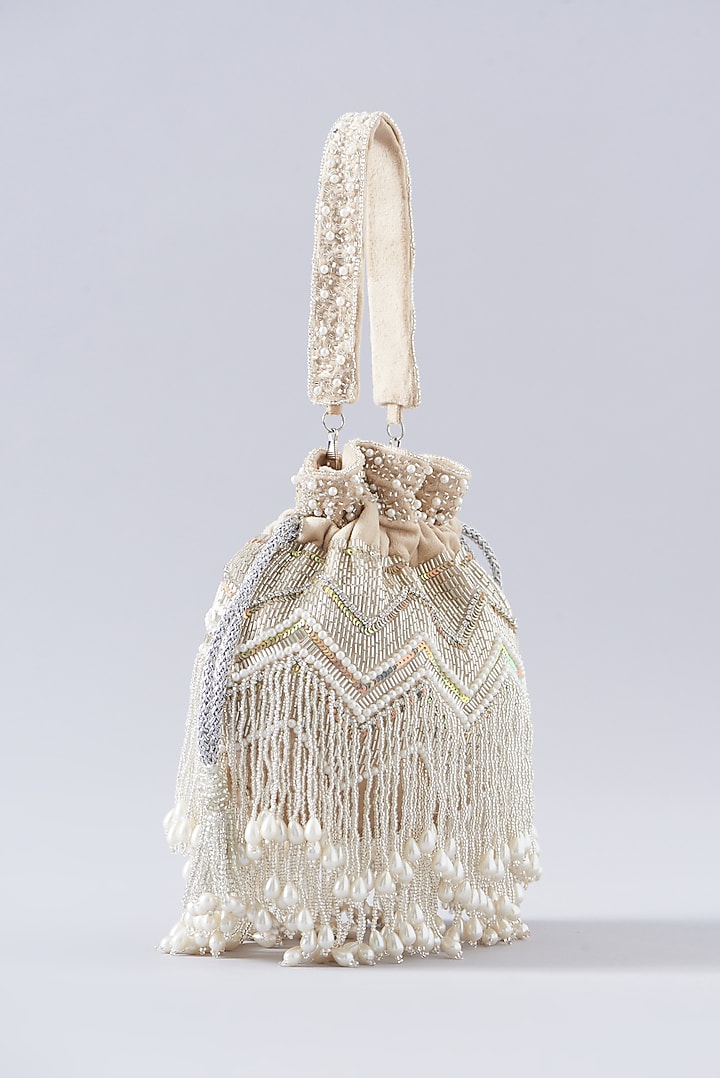 Beige Silk Embellished Potli Bag by A Clutch Story at Pernia's Pop Up Shop
