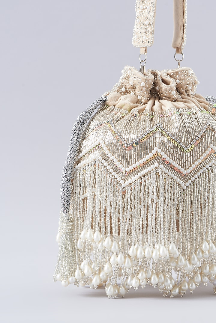 Beige Silk Embellished Potli Bag by A Clutch Story at Pernia's Pop Up Shop