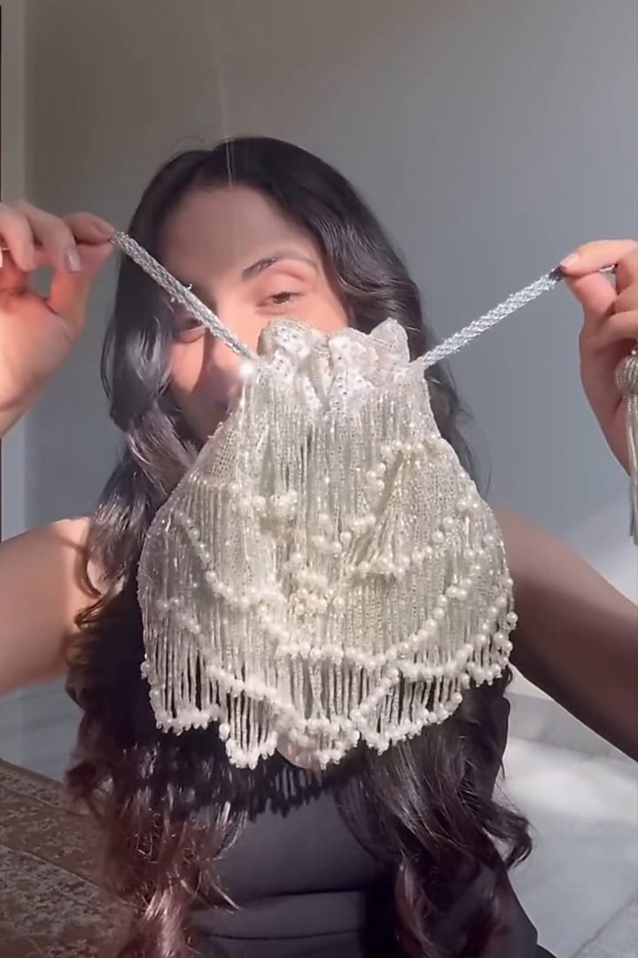 Silver Silk Embroidered Potli by A Clutch Story at Pernia's Pop Up Shop