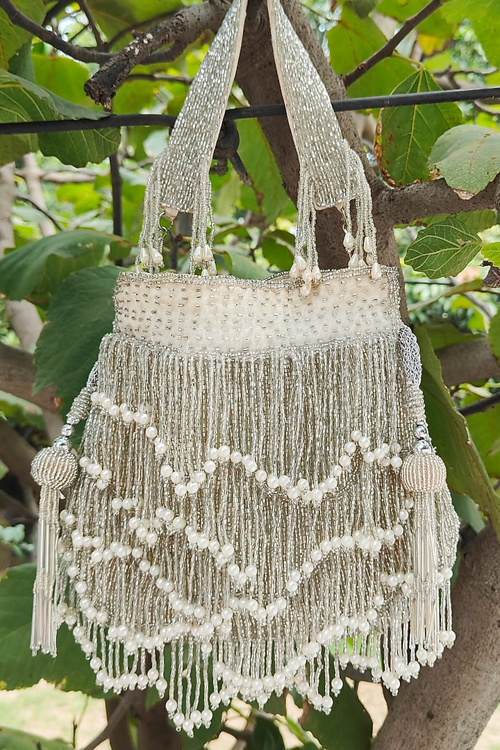 Silver Silk Embroidered Potli by A Clutch Story at Pernia's Pop Up Shop