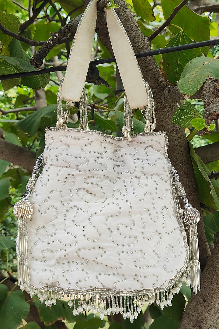 Silver Silk Embroidered Potli by A Clutch Story at Pernia's Pop Up Shop