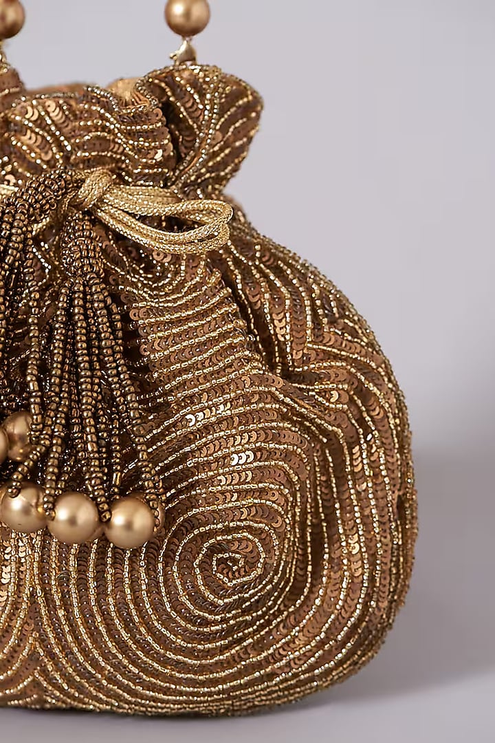 Copper Silk Hand Embroidered Potli by A Clutch Story at Pernia's Pop Up Shop
