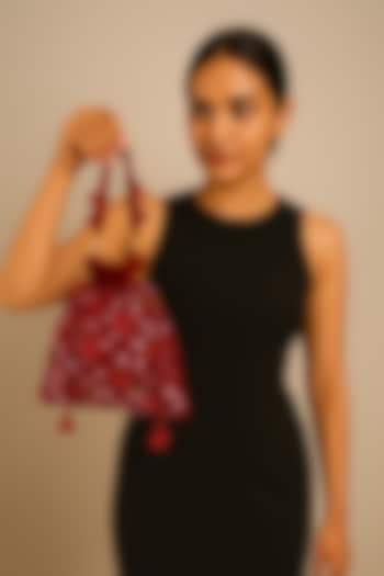 Maroon Suede Sequins Hand Embroidered Potli by A Clutch Story at Pernia's Pop Up Shop